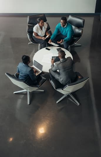 Team collaborating around a meeting table